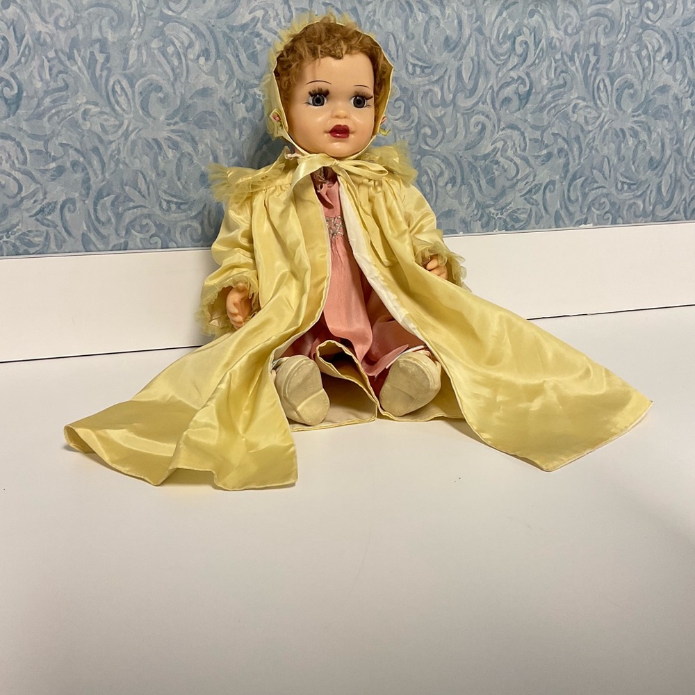 Vintage (from 50s) Terri Lee Baby Doll in Yellow coat and bonnet with Pink Dress